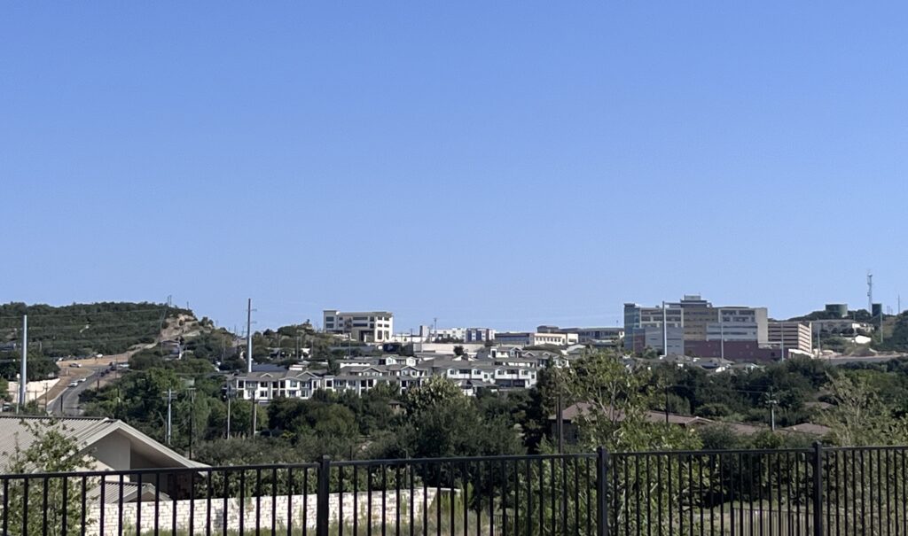 Baylor Scott and White Medical Center building on a hillside along RM 620 in Lakeway